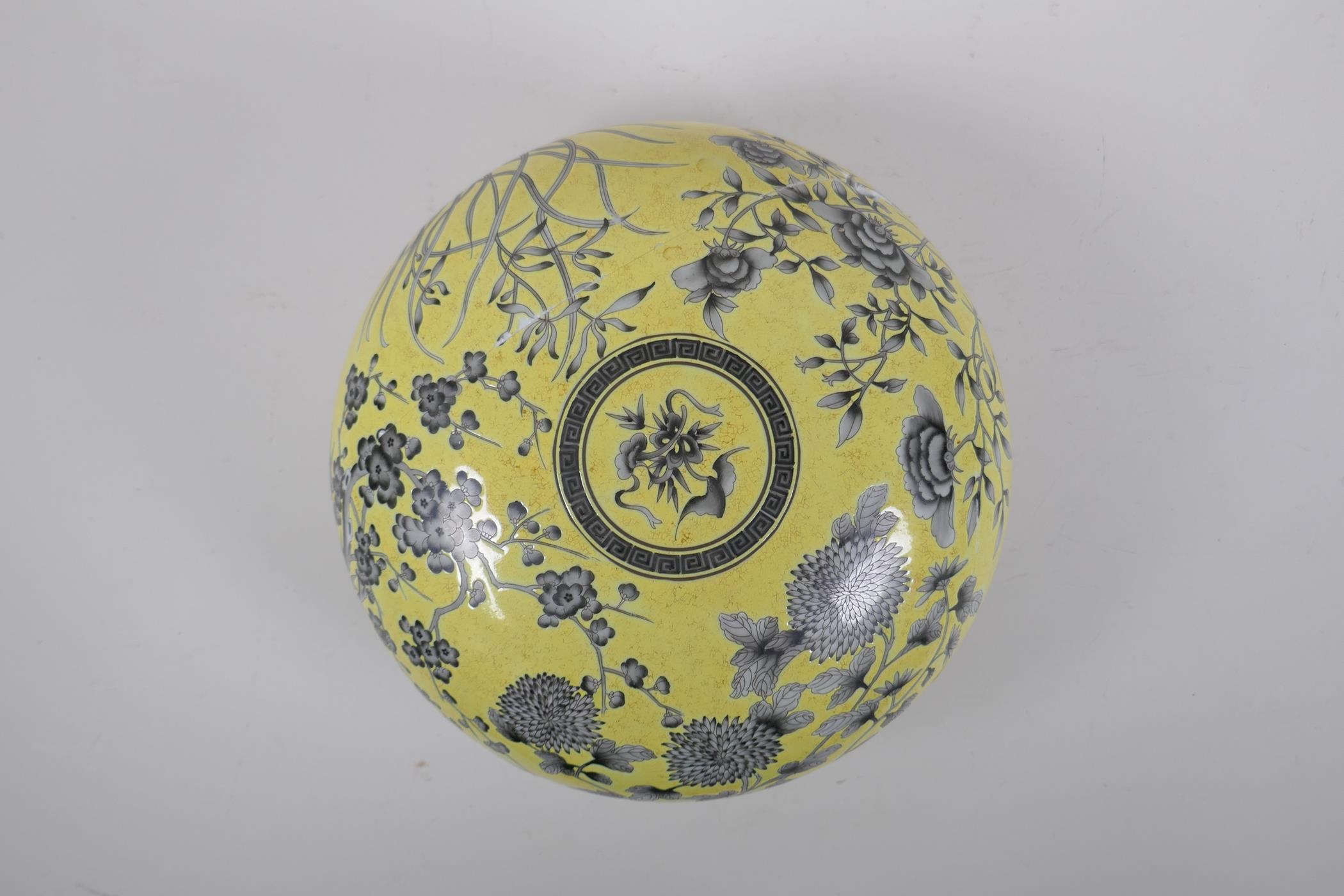 A Chinese yellow ground porcelain box and cover with black and white floral decoration, seal mark to - Image 2 of 6