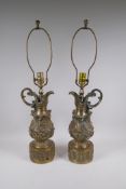 A pair of bronzed metal ewer shaped lamps, 70cm high
