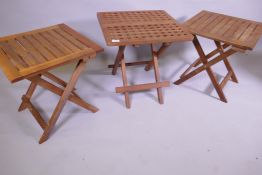 A pair of wood garden tables, 46 x 46 x 48cm, and another similar