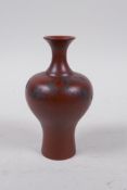 A Chinese miniature redware stem vase, decoration with a branch in bloom, character mark to base,