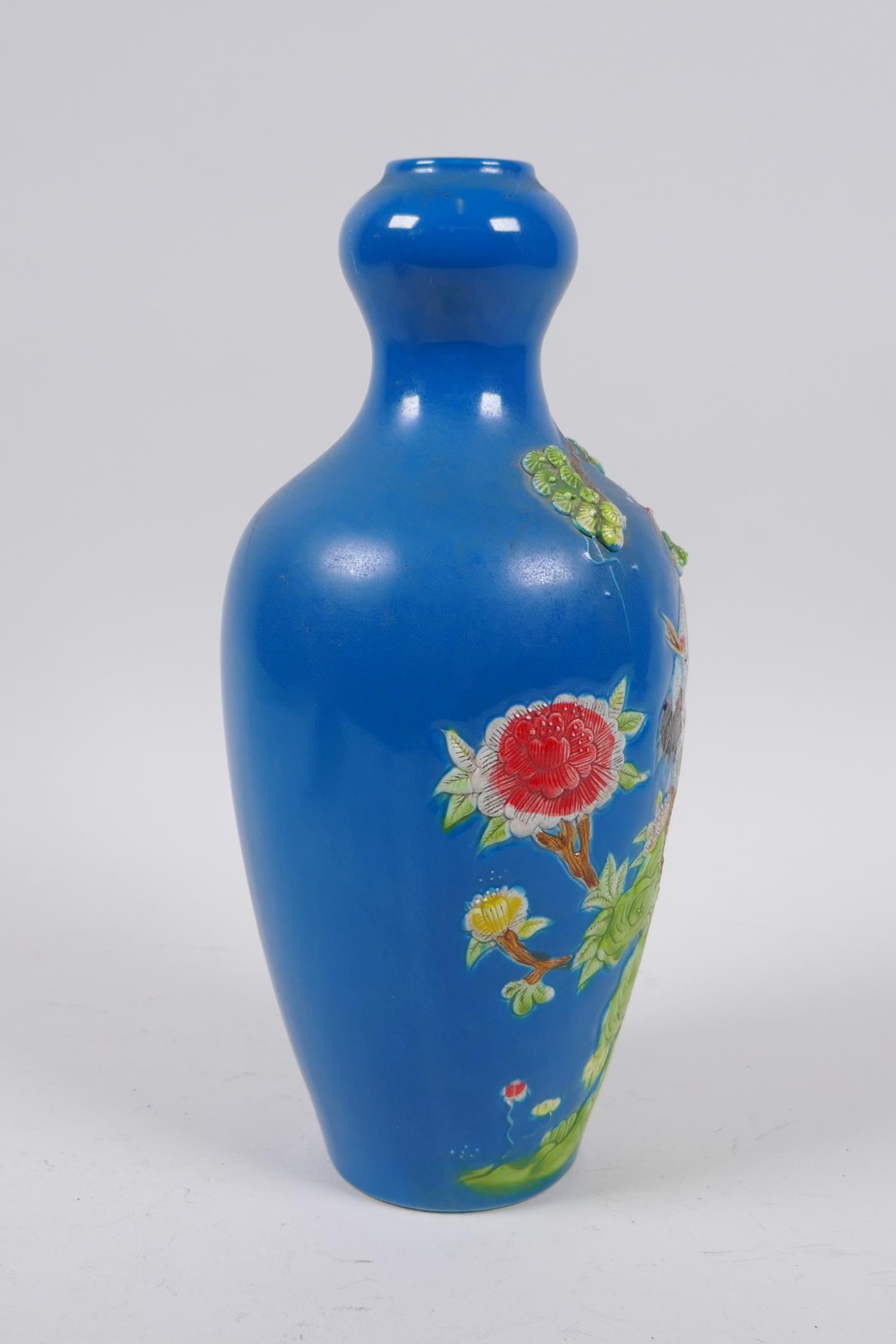 A Chinese blue ground porcelain garlic head shaped vase with raised and painted red crowned crane - Image 3 of 4