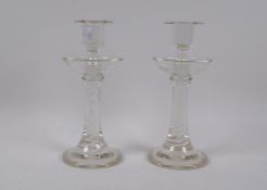 A pair of antique glass air twist candlesticks, 24cm high
