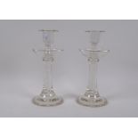 A pair of antique glass air twist candlesticks, 24cm high