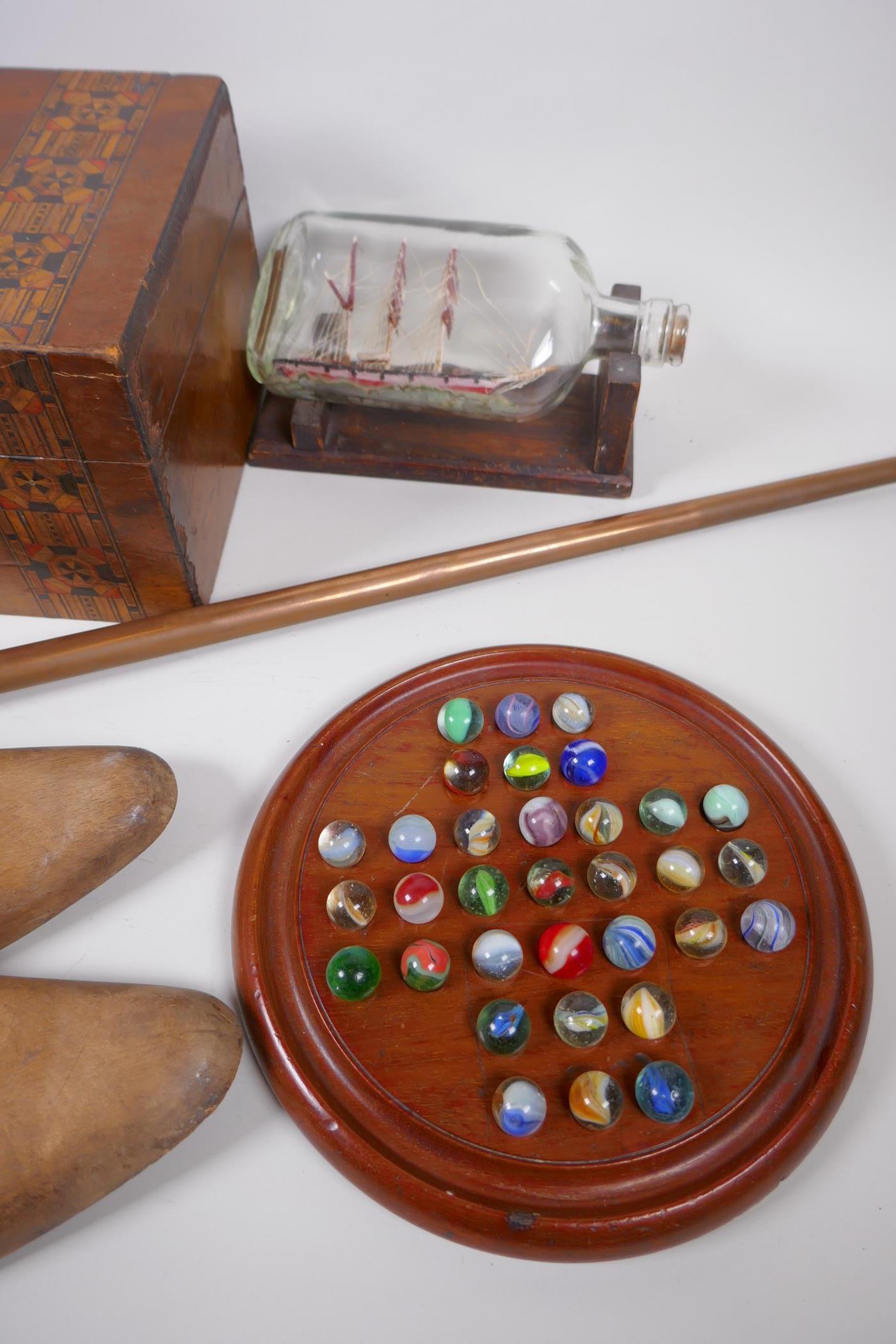 A mahogany solitaire board with marbles, a ship in a bottle, wooden thermometer, Tonbridgeware - Image 2 of 5