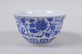 A blue and white porcelain tea bowl with scrolling lotus flower decoration, Chinese Qianlong seal
