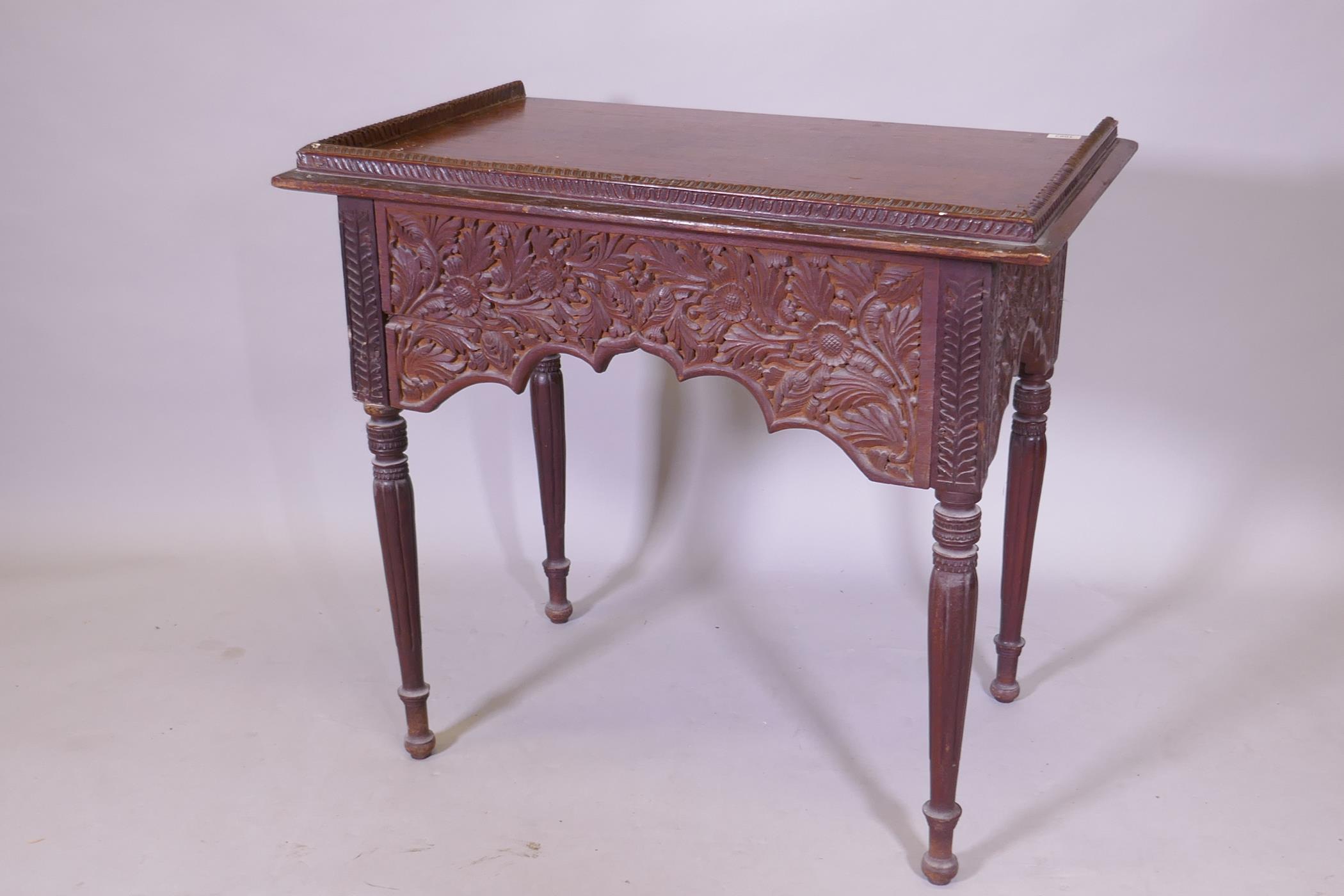 C19th Anglo Indian two drawer padouk writing table with three quarter gallery and carved floral - Image 4 of 4