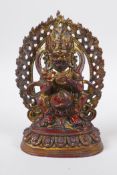 A Tibetan gilt and lacquered bronze figure of a wrathful deity, 17cm high