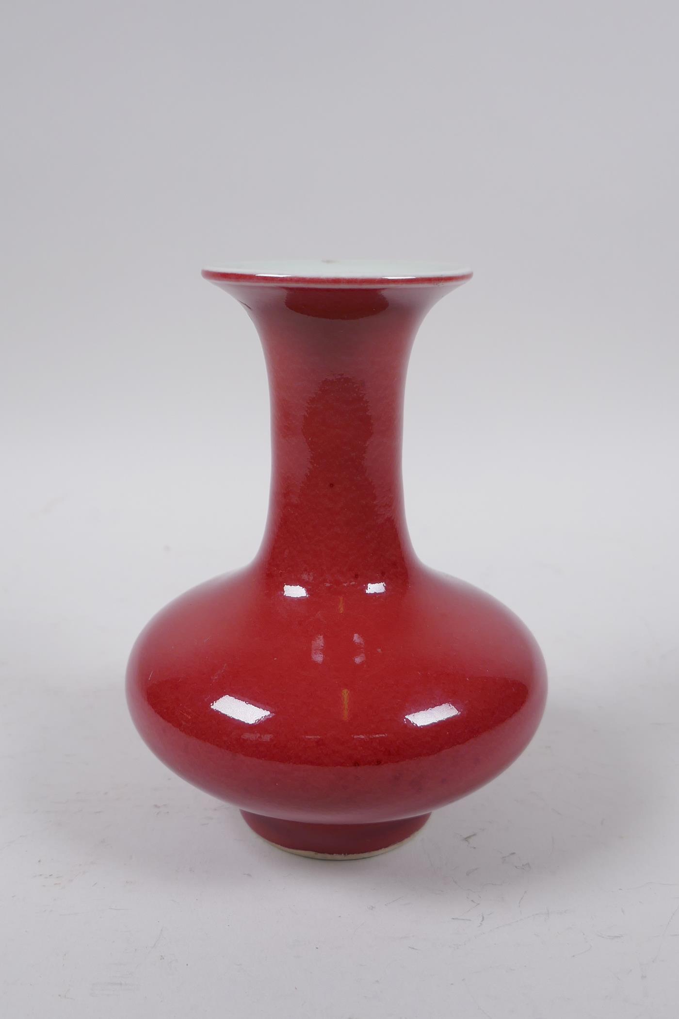 A Chinese sang de boeuf glazed porcelain vase, 14cm high
