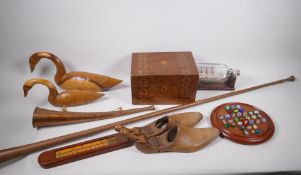 A mahogany solitaire board with marbles, a ship in a bottle, wooden thermometer, Tonbridgeware