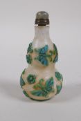 A Peking glass double gourd snuff bottle with raised butterfly decoration, 4 character mark to base,