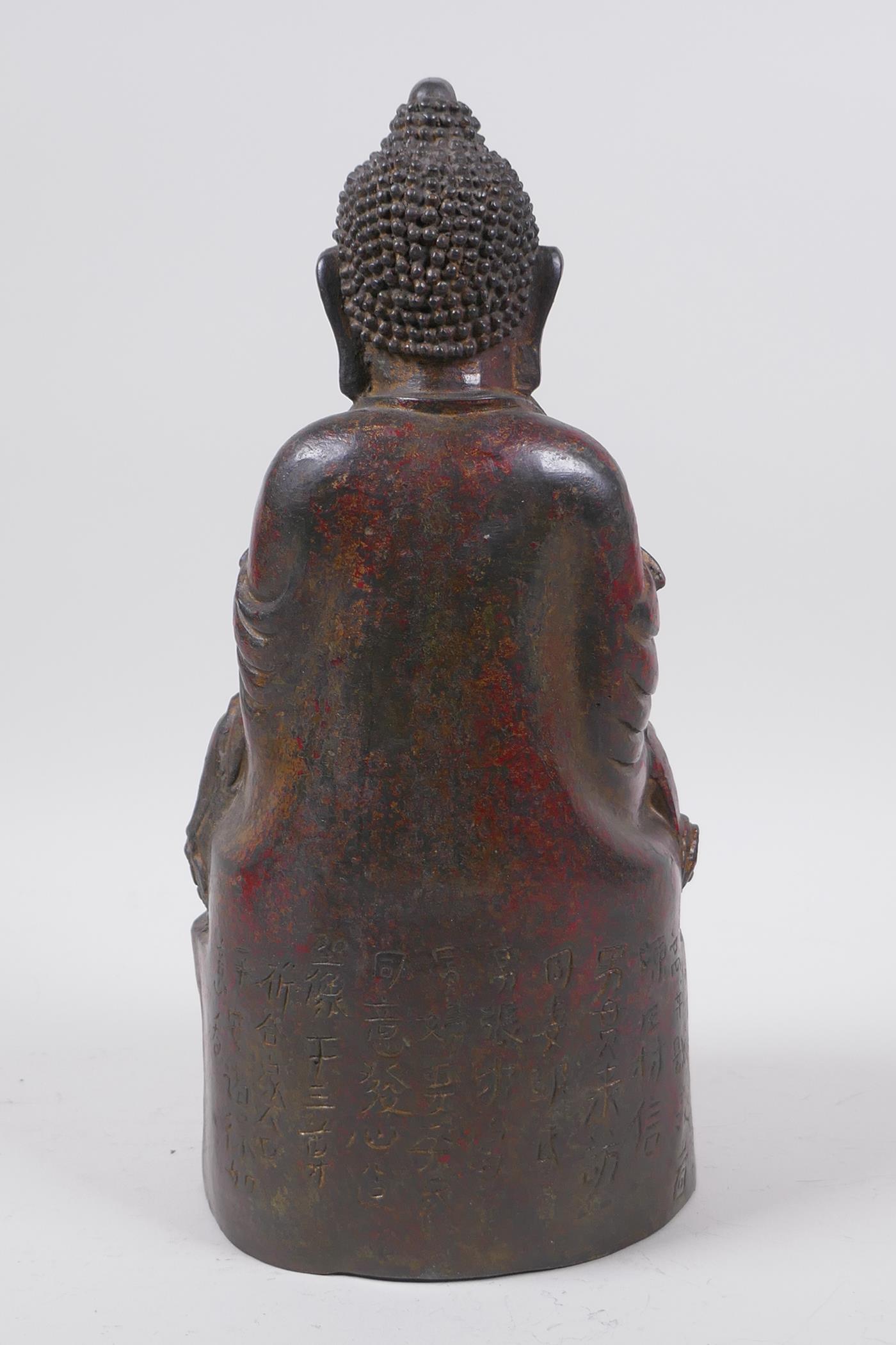 A Chinese bronze of buddha seated in meditation, with a character inscription to the reverse and the - Image 3 of 5