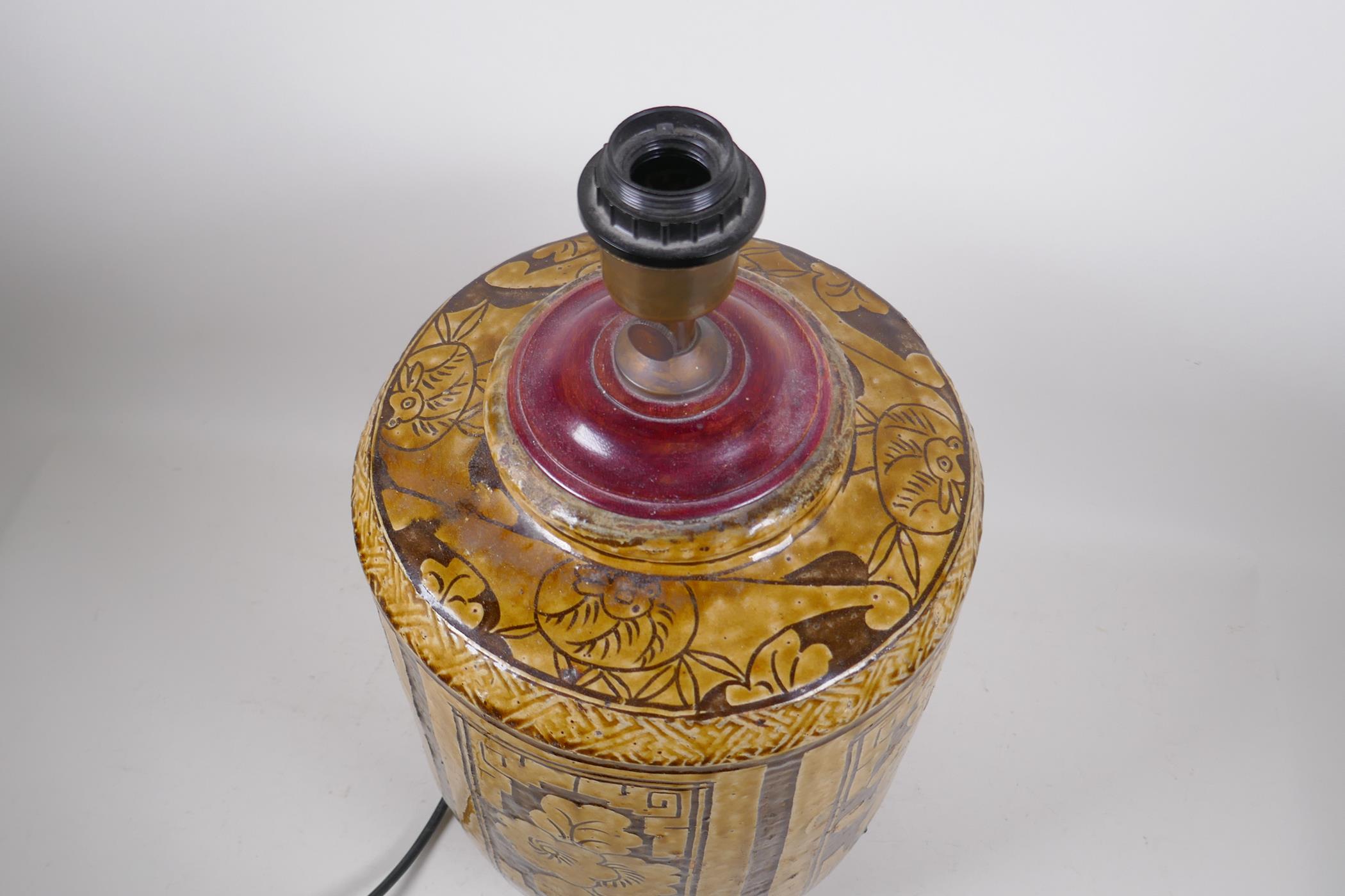 A C19th Chinese Cizhou kiln pottery jar, with decorative floral panels and bats, converted to a - Image 4 of 5