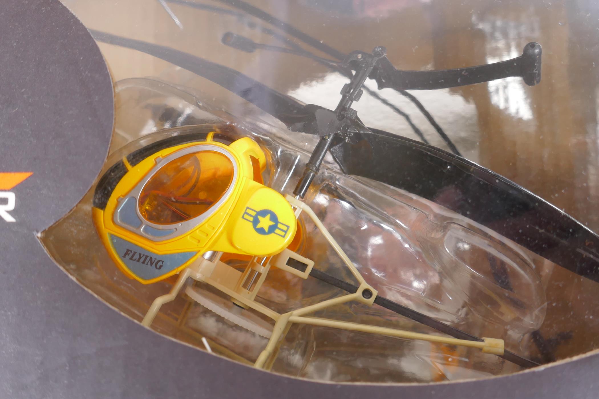 A remote control helicopter, The Nano Copter, in original box, the remote controlled Firefly in - Image 5 of 5