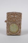 A Chinese white metal cased Zorro lighter with a jade setting depicting a dragon, 6cm high
