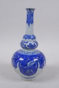 A Chinese blue and white porcelain stem vase, 18cm high