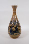 A C19th oriental blue and white pottery pear shaped vase decorated with ducks and fish, possibly