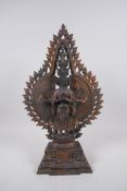 A Sino Tibetan gilt bronze of Buddha with many arms and faces, 40cm high