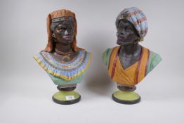 Bernard Bloch, a pair of painted terracotta busts of Moors, 42cm high