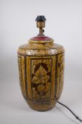 A C19th Chinese Cizhou kiln pottery jar, with decorative floral panels and bats, converted to a