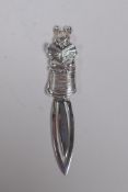 A sterling silver bookmark decorated with a mouse from Beatrix Potter's The Tailor of Gloucester,