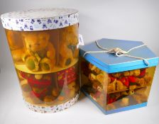 Two display boxes of Harrods teddy bears, ten Christmas bears and twenty seven smaller bears