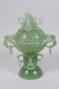A C19th Chinese carved celadon jade censer and cover, with dragon and free ring decoration, 18cm