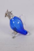 A blue glass and silver plate decanter in the form of a crested cockatoo, with glass eyes, 16cm high