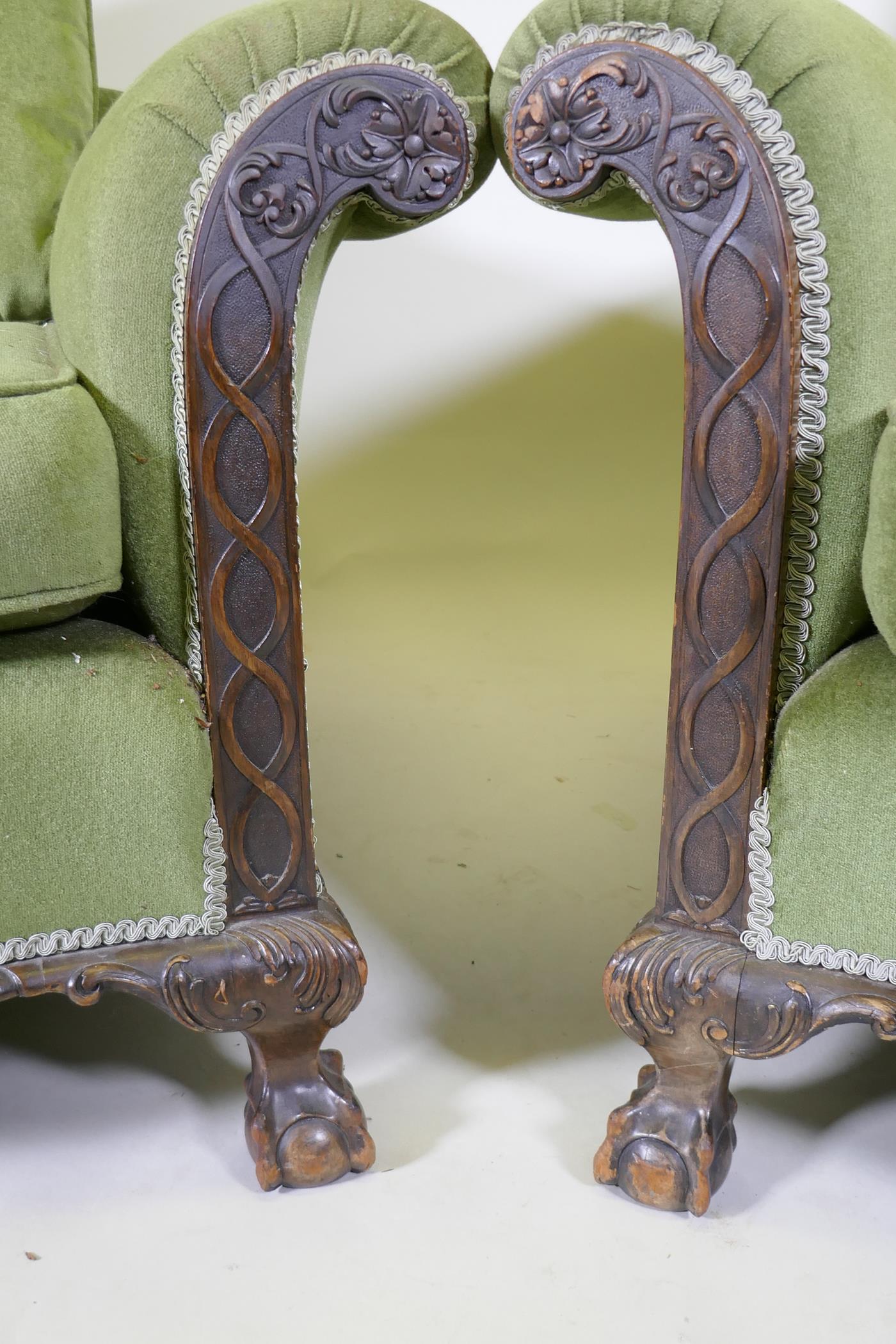 A pair of country house deep seated Chippendale style armchairs with card decoration, raised on - Image 4 of 4