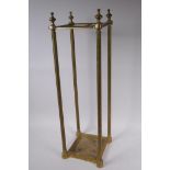 A brass stick stand, 62cm high, 19cm square