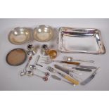 A quantity of silver and plated items including a pair of hallmarked bonbon dishes, 200g, dwarf