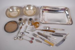 A quantity of silver and plated items including a pair of hallmarked bonbon dishes, 200g, dwarf