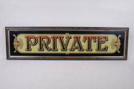 A reverse painted glass 'Private' sign, 80 x 22cm