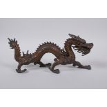 A Chinese gilt bronze dragon, 25cm long