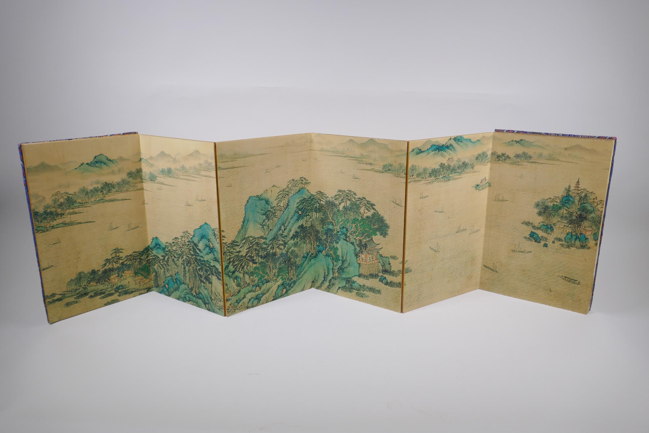 A Chinese printed concertina book decorated with an extensive riverside landscape, 18 x 28cm - Image 2 of 3