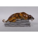 A rare 1950s Paragon fine bone china figure of a crouching tiger, 24cm long