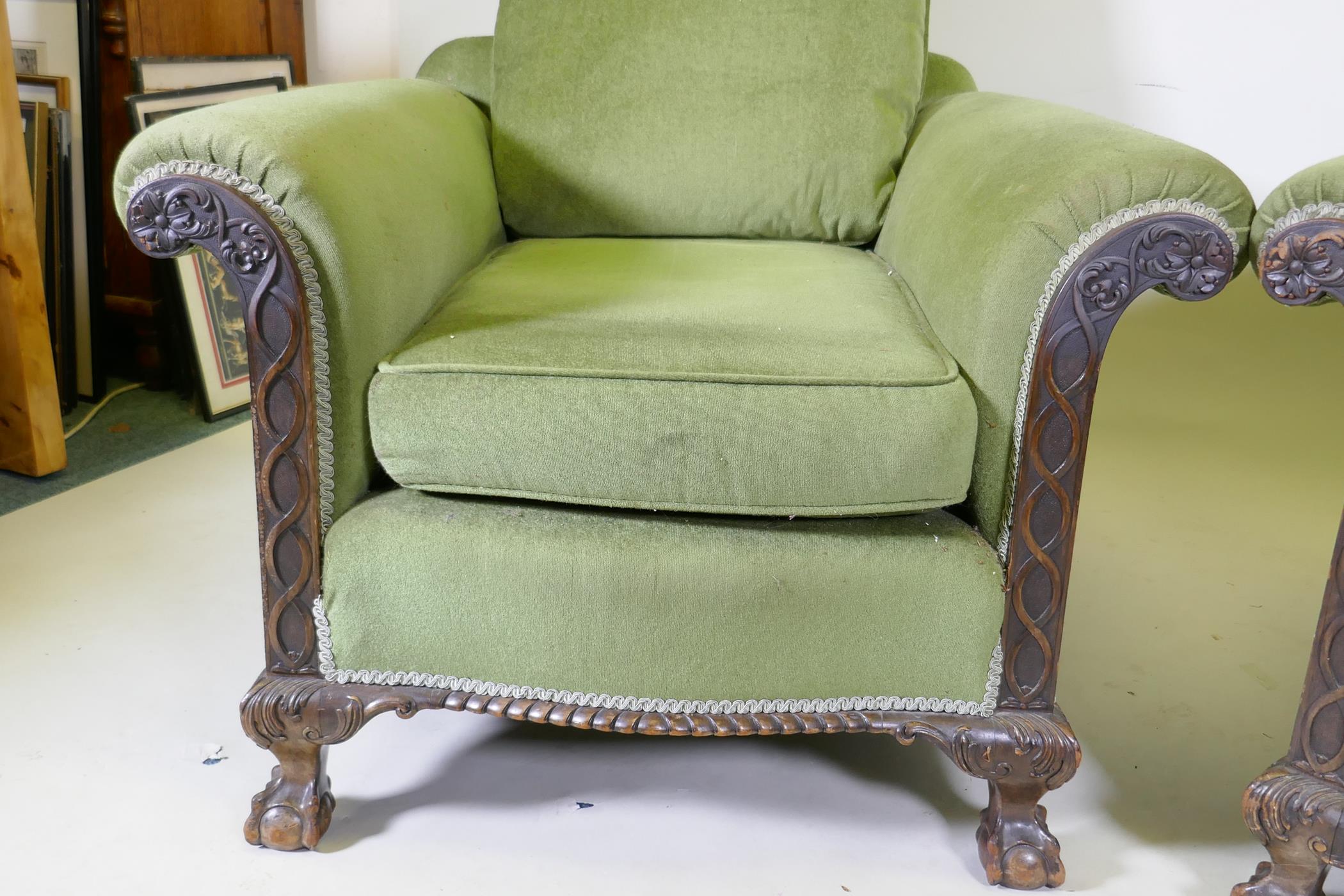 A pair of country house deep seated Chippendale style armchairs with card decoration, raised on - Image 3 of 4