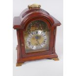 A walnut cased bracket clock by Christian Huygens, with painted brass dial and silvered chapter