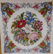 A woolwork of flowers within a border, in a good C19th birdseye maple frame, 45 x 46cm