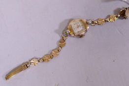 A Roamer Incabloc gold plated lady's cocktail watch on a 9ct gold link bracelet, bracelet approx 6gm