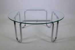 A 1970s tubular chrome and glass coffee table in the manner of Rodney Kinsman, 39cm high, 92cm