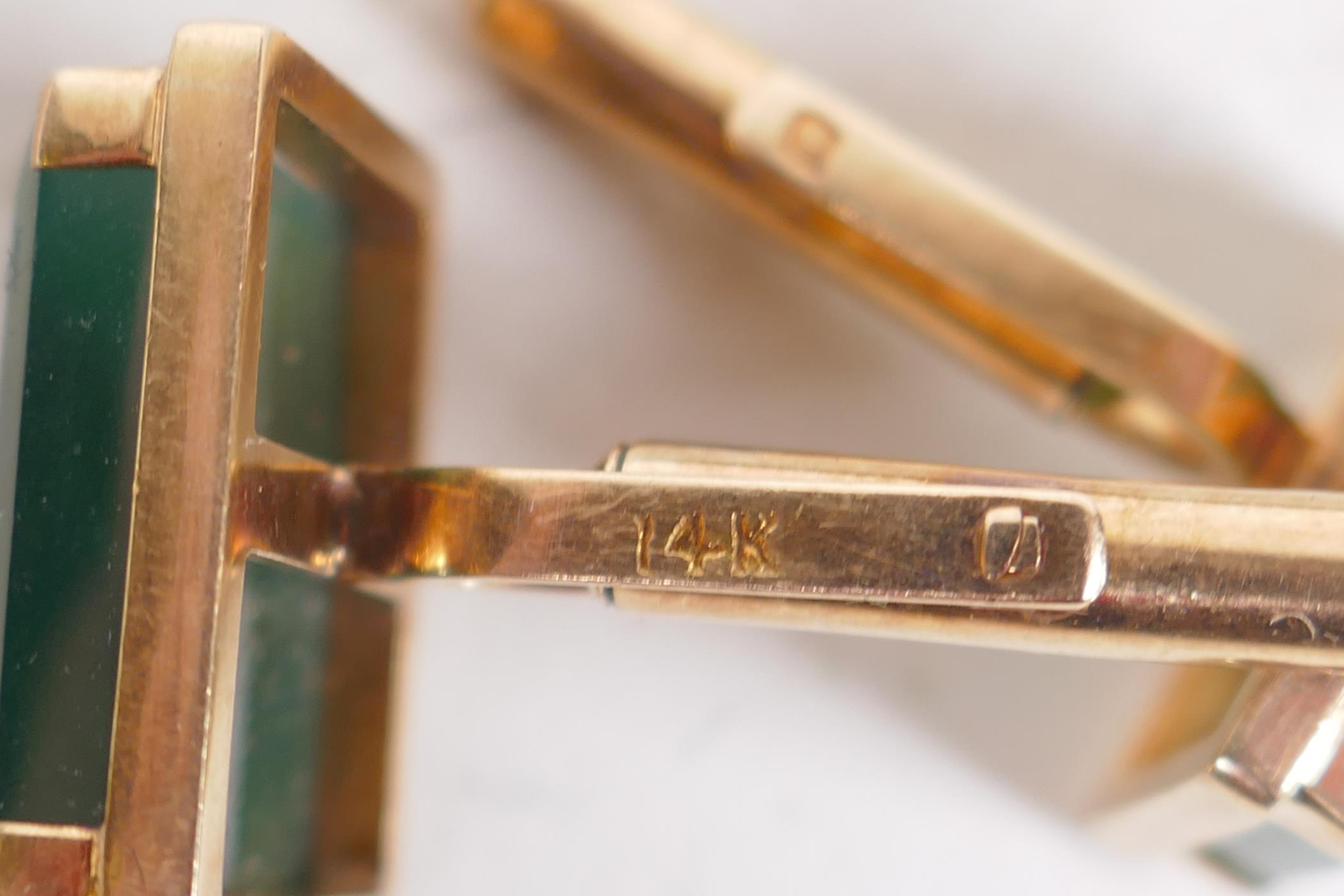 A pair of gold and green stone cufflinks, marked 14k, gross 12.1g - Image 3 of 3