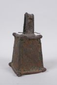 An antique African benin bronze bell, 14cm high