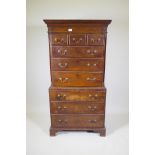 A C19th mahogany chest on chest of small proportions, the upper section with three short and three