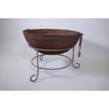 A 'La Hacienda' wrought and rivitted metal fire pit, 62cm diameter