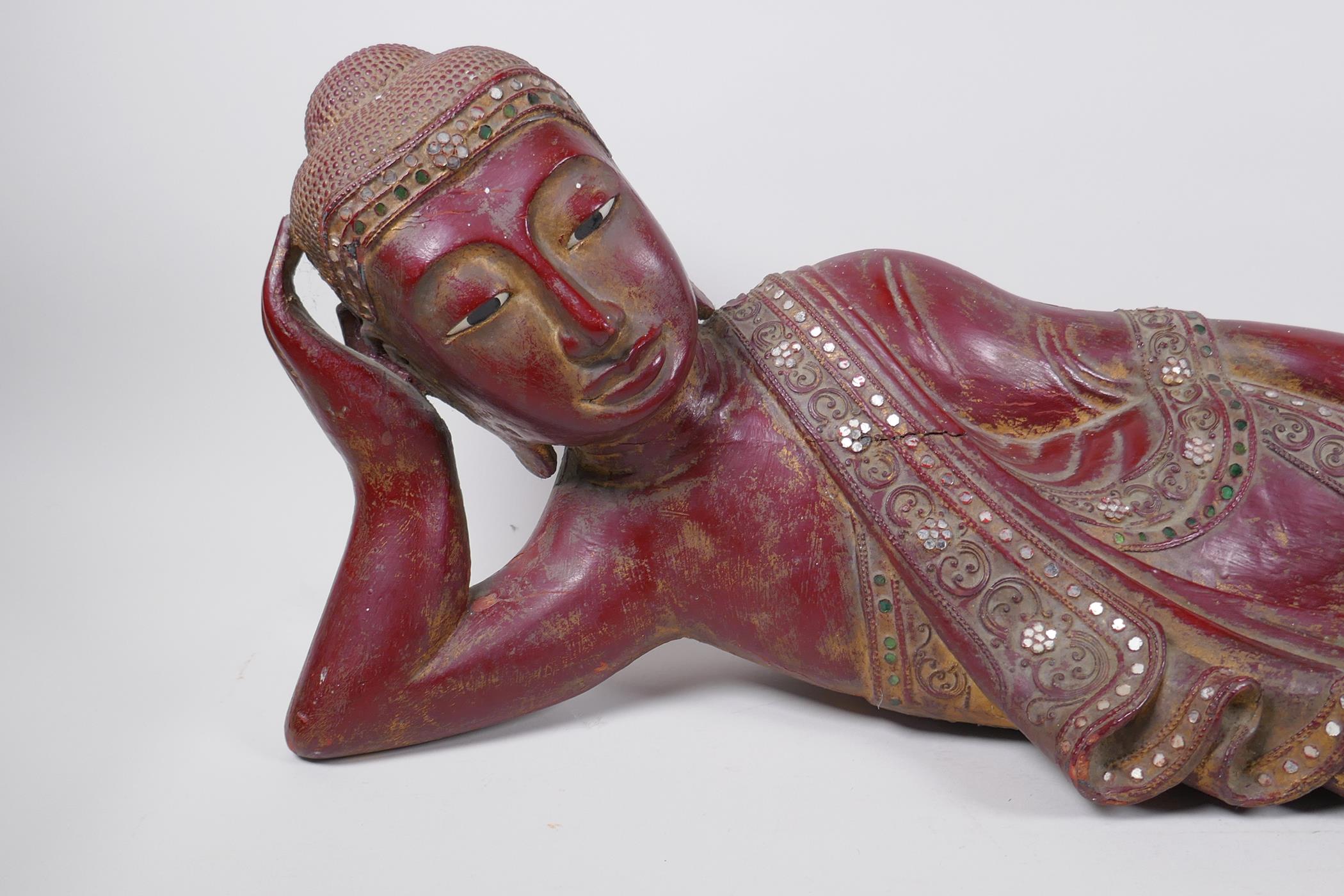An antique Burmese carved and lacquered wood reclining figure of Buddha, 78cm long - Image 2 of 7