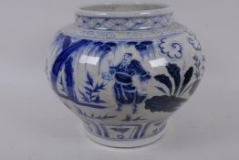 A Chinese blue and white porcelain jar decorated with figures and foliage with glazed character