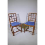 A pair of 1930s Heal & Sons oak lattice back side chairs