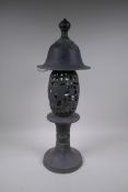 A Chinese bronze lantern with pierced dragon decoration, 62cm high