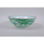 A Chinese porcelain rice bowl with enamelled dragon decoration, Chenghua 6 character mark to base,