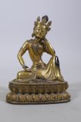 A gilt bronze figure of Buddha, 20cm high